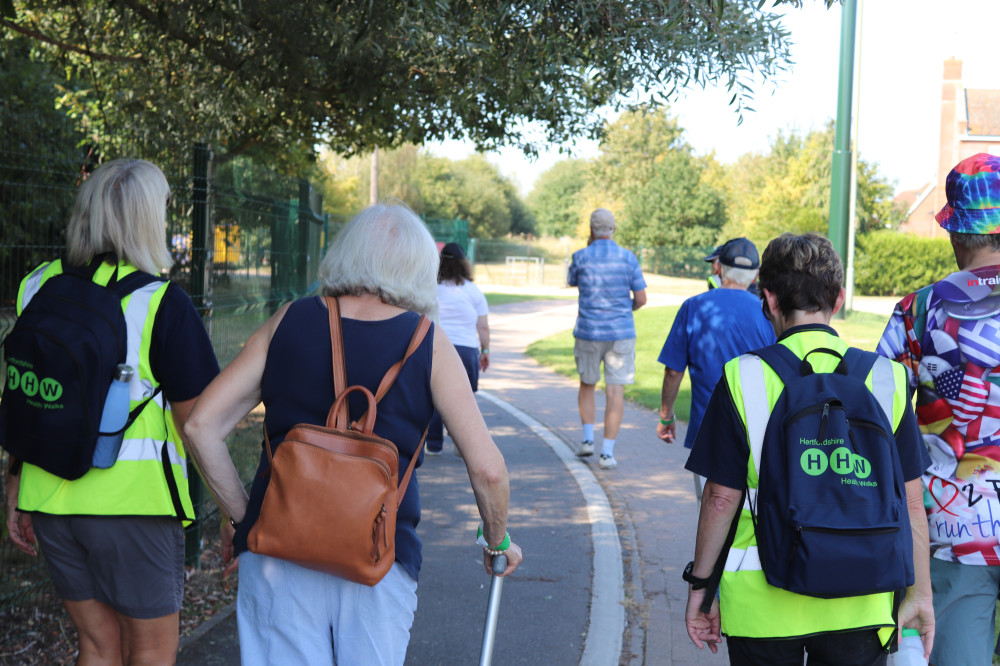Adults enjoying a Hertfordshire Health Walk in the countryside