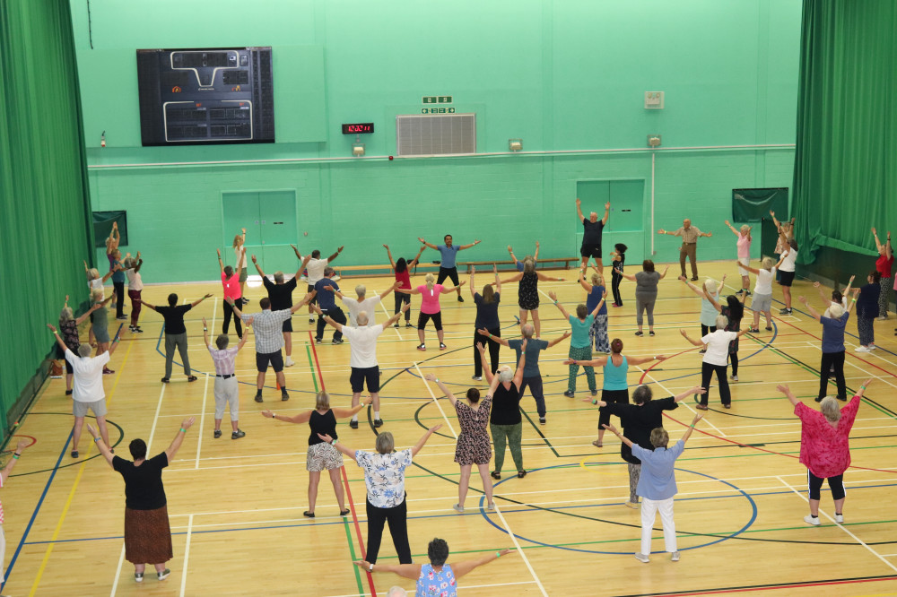 Older adults enjoying a strength and balance class in Hertfordshire